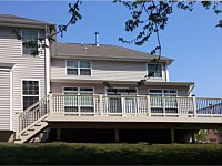 <b>29-Composite deck with tan vinyl railing and tan facia wrap</b>